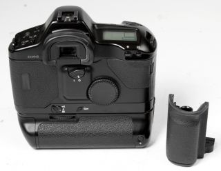 bidding for canon eos 1n 35mm camera w power booster e1 serial no