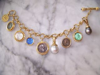 Elizabeth Lockes classic and perfect 19kt gold charm bracelet. This