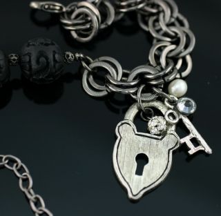 Graziano Gun Metal Black Carved Cinnabar Charm Necklace
