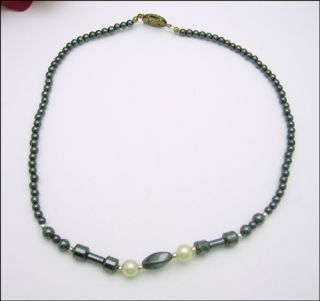 up for bid is this vintage hematite bead necklace