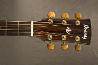  headstock includes Gold Grover® Tuners with Brown Pearloid Knobs