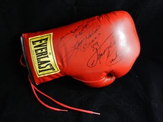 Boxing Glove Signed by Muhammad Ali Ken Norton Larry Holmes and Joe