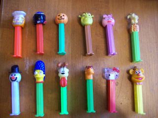 COLLECTABLE PEZ CANDY DISPENSERS HELLO KITTY SHREK GARFIELD MARG SIMP