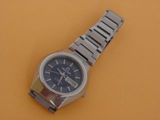 Vintage Milus Swiss Automatic Mens Wristwatch Double Calnedar