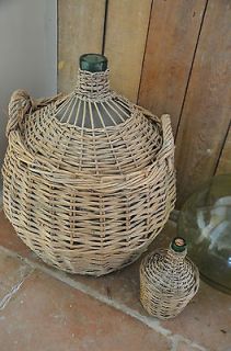 antique French wicker covered glass demijohn