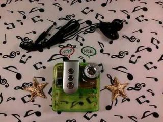 Portable Small/Compact FM Radio with Belt Clip, Light and Earphones