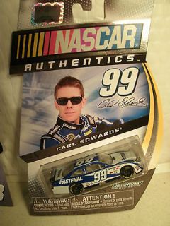 CARL EDWARDS NEW FROM 2012 #99 FASTENAL ROUSH FORD SPIN MASTER 1/64