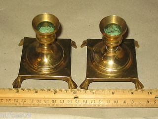 set of 2 brass candle sticks marked HB solid brass candle holders