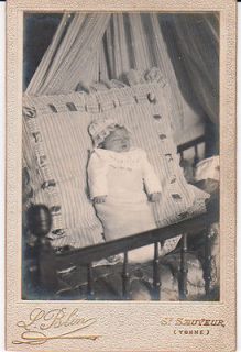 Cabinet Photograph Post Mortem of a Young baby french holds flowers