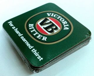 VICTORIA BITTER SET OF FOUR (4) CORK BACK VB COASTERS BRAND NEW IN
