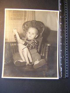 Photo D0317 1 year old boy sits n chair w blowup giraffe animal toy