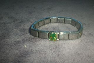 Italian charm braclet with some charms used in good shape